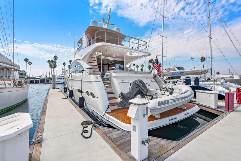 Slide: The Image of 2015 Princess 72 Motor Yacht cruising on open sea under clear blue sky. - 49