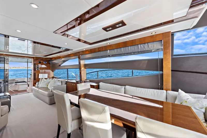 Slide: The Image of Luxurious 2015 Princess 72 Motor Yacht deck with ocean view and elegant seating area. - 7