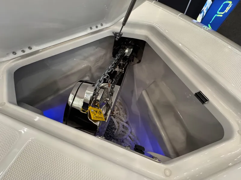 Slide: The Image of Anchor compartment of 2025 Solace 32 CS boat with chain and rope. - 18