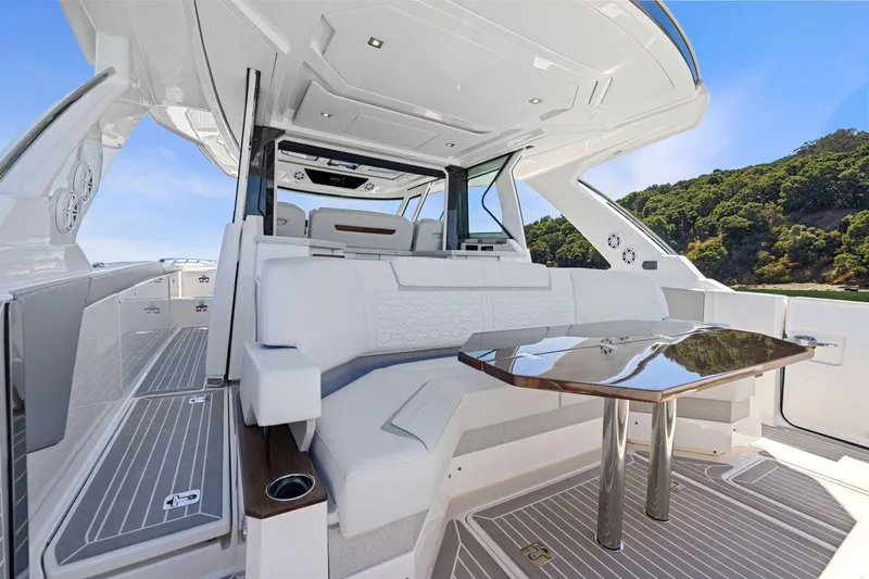 Slide: The Image of Luxurious 2024 Tiara Yachts 48 LS interior with sleek seating and elegant table. - 20