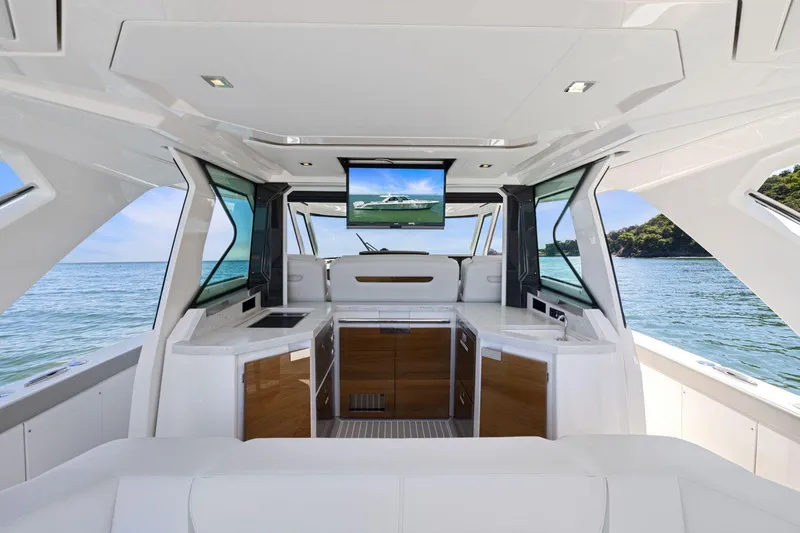 Slide: The Image of Luxurious interior of 2024 Tiara Yachts 48 LS with modern amenities and scenic ocean view. - 23
