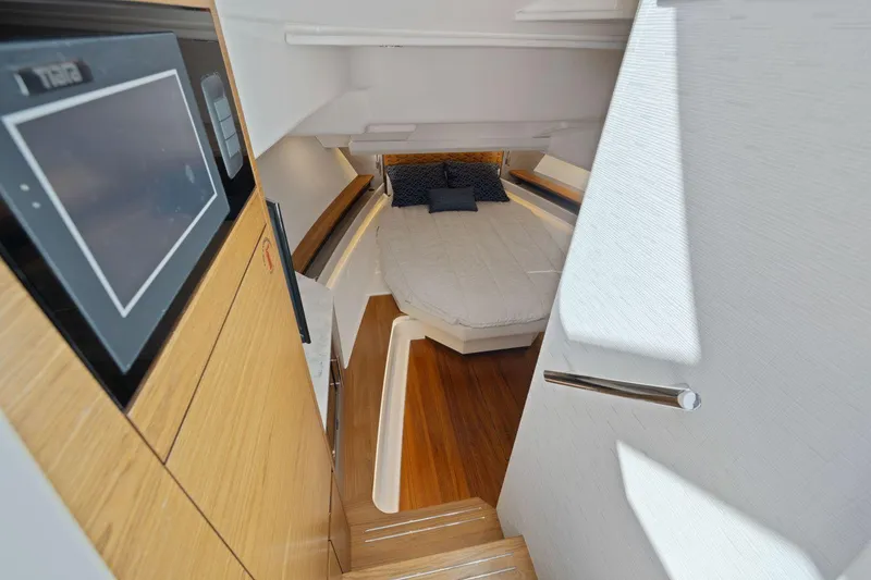 Slide: The Image of Luxurious interior of 2024 Tiara Yachts 48 LS, featuring a cozy cabin and modern amenities. - 41