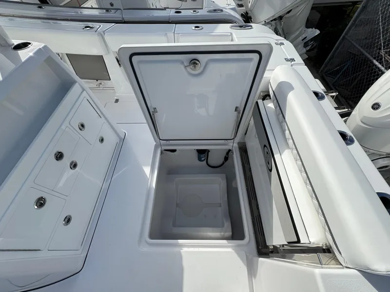 Slide: The Image of 2025 Sportsman Open 302 boat interior with open storage compartment. - 39