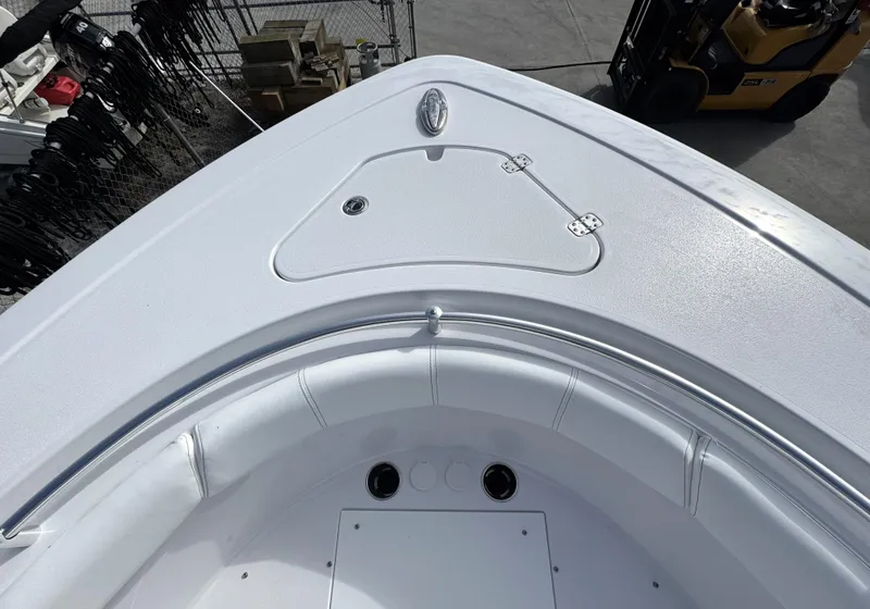 Slide: The Image of 2025 Sportsman Open 302 boat deck, featuring sleek design and storage compartment. - 4