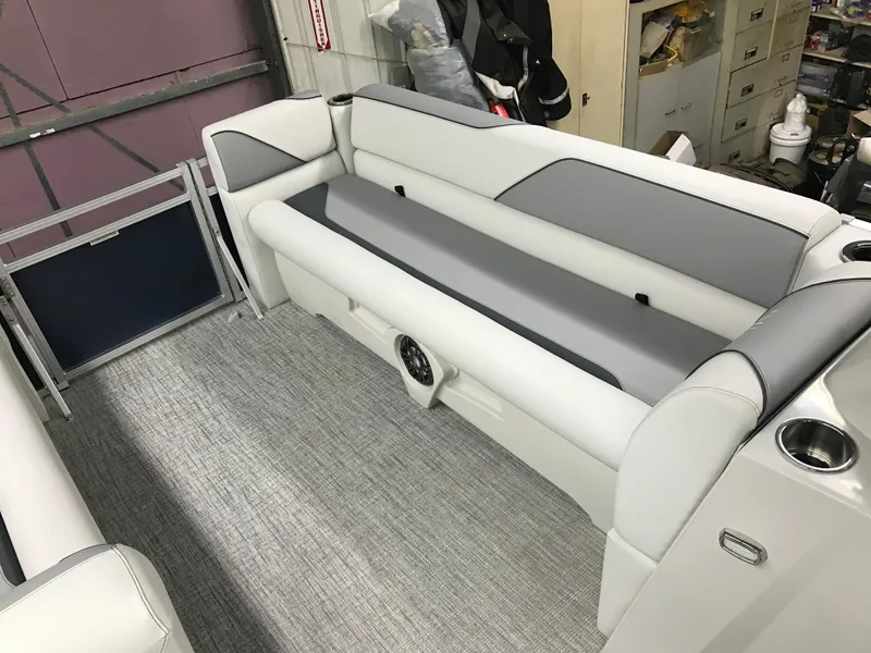 Slide: The Image of 2025 Avalon Venture Cruise Rear Bench, 22-foot, featuring sleek gray and white seating design. - 11