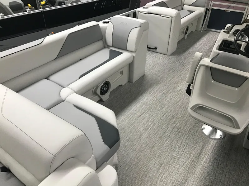 Slide: The Image of 2025 Avalon Venture Cruise Rear Bench, 22-foot boat interior with modern seating and sleek design. - 15