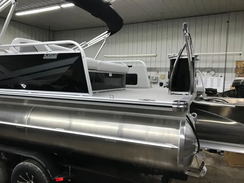 Slide: The Image of 2025 Avalon VENTURE 2585 VERSATILE REAR BENCH pontoon boat in a showroom. - 10