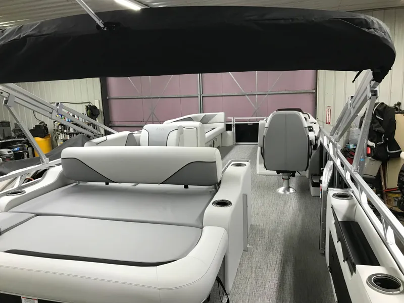 Slide: The Image of 2025 Avalon VENTURE 2585 Versatile Rear Bench pontoon boat interior view. - 11