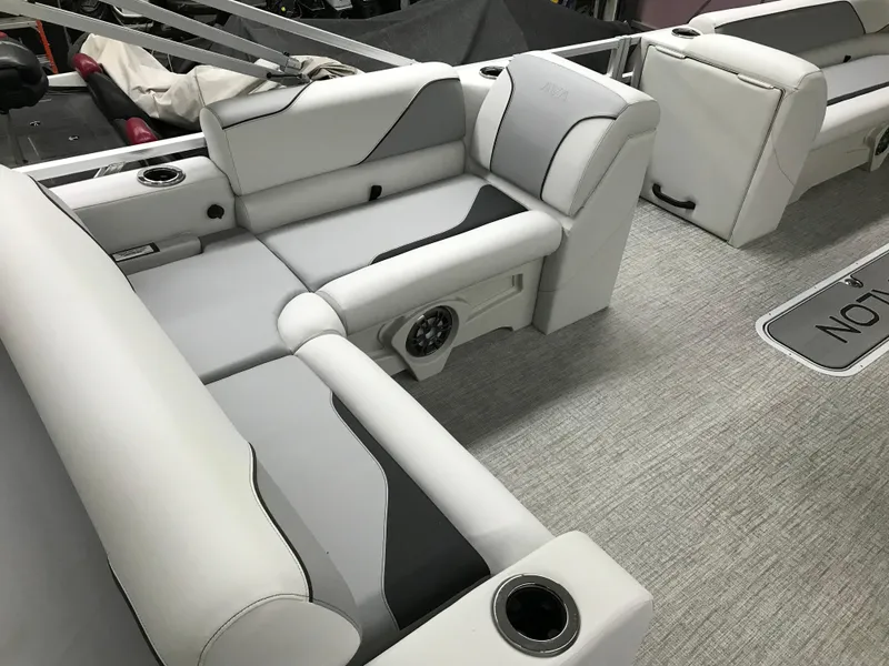 Slide: The Image of 2025 Avalon VENTURE 2585 VERSATILE REAR BENCH pontoon boat in a garage. - 13