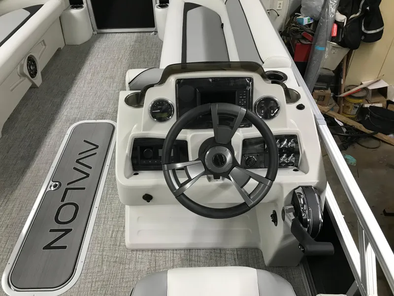 Slide: The Image of 2025 Avalon VENTURE 2585 Versatile Rear Bench pontoon boat interior with modern seating. - 15