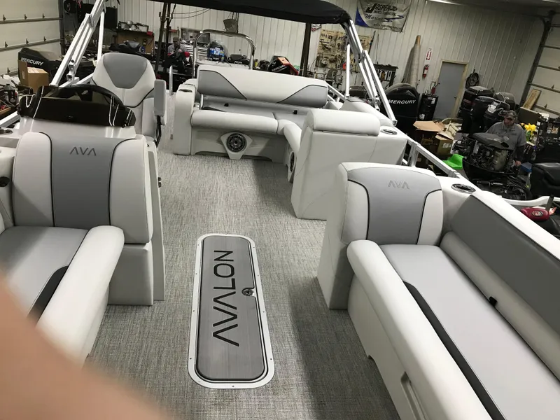 Slide: The Image of 2025 Avalon VENTURE 2585 Versatile Rear Bench with modern seating and cup holders. - 17