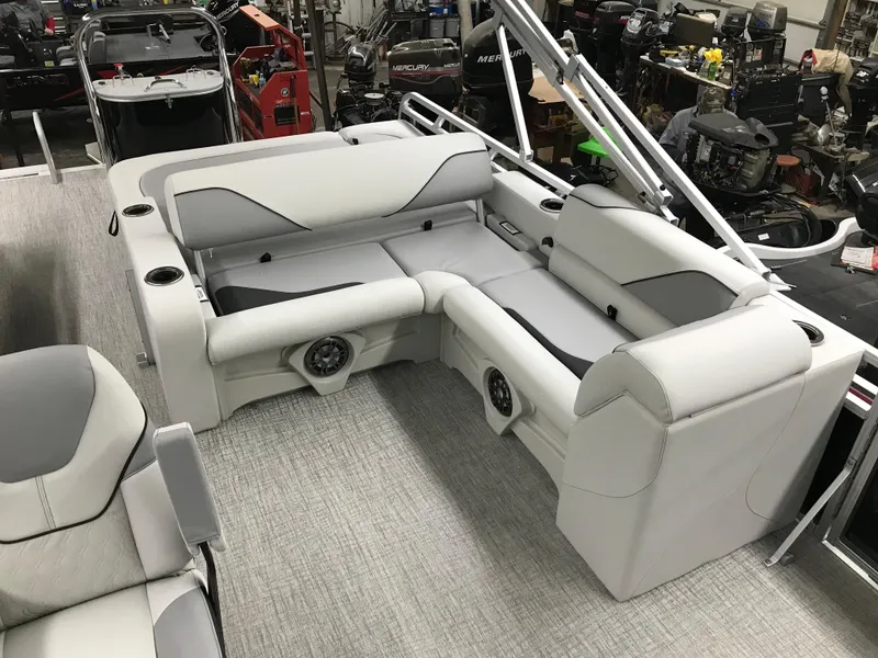 Slide: The Image of 2025 Avalon VENTURE 2585 Versatile Rear Bench interior with modern seating and steering console. - 18