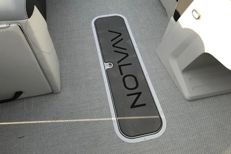 Slide: The Image of 2025 Avalon VENTURE 2585 VERSATILE REAR BENCH interior floor with logo detail. - 32