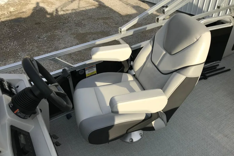 Slide: The Image of Captain's chair in 2025 Avalon VENTURE 2585 VERSATILE REAR BENCH boat, featuring sleek design. - 33