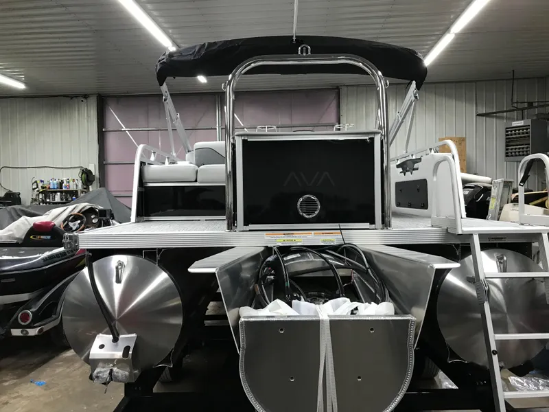 Slide: The Image of Close-up of a 2025 Avalon VENTURE 2585 VERSATILE REAR BENCH engine component with serial number. - 5