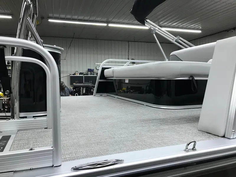 Slide: The Image of 2025 Avalon VENTURE 2585 Versatile Rear Bench pontoon boat on trailer. - 6