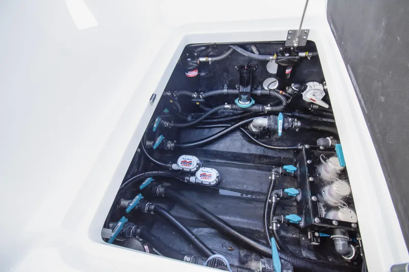Slide: The Image of 2024 Yellowfin 39 boat plumbing system with hoses and fittings. - 23