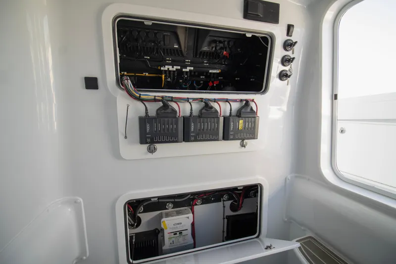 Slide: The Image of 2024 Yellowfin 39 electrical panel with wiring and components. - 36