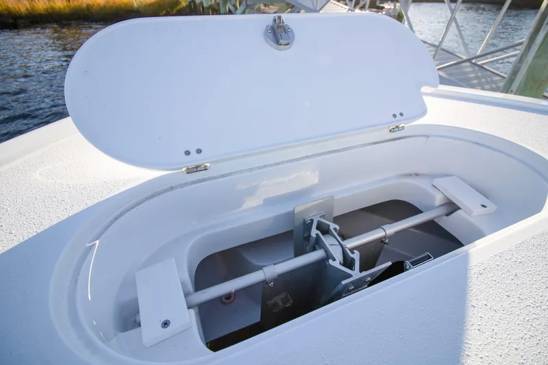 Slide: The Image of 2024 Yellowfin 39 boat storage compartment open on deck. - 40