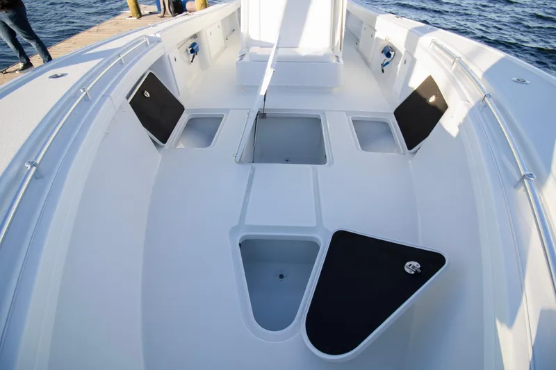 Slide: The Image of 2024 Yellowfin 39 boat interior with storage compartments and sleek design. - 41