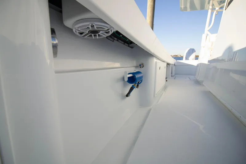 Slide: The Image of 2024 Yellowfin 39 boat interior with sleek white design and modern features. - 44