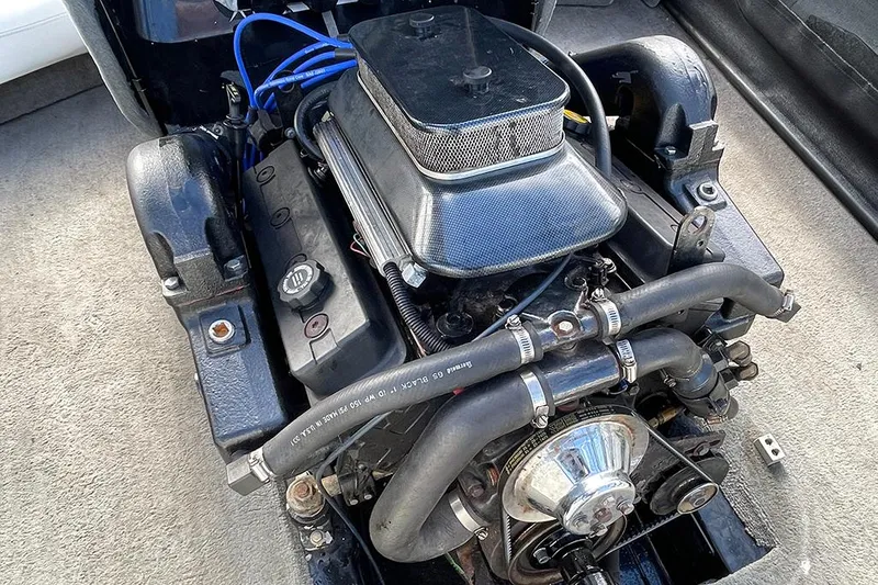 Slide: The Image of 1999 Malibu Response LX engine, detailed view of components and layout. - 11