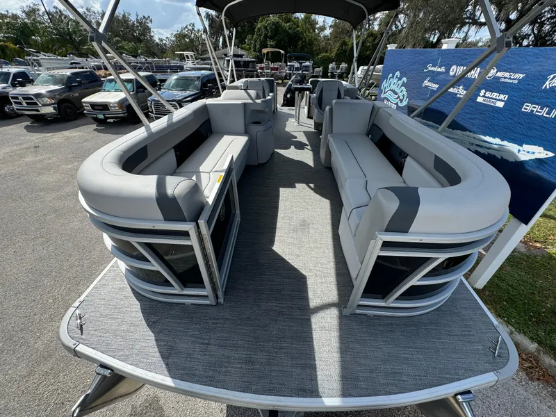 Slide: The Image of 2025 Sweetwater 2286 SB pontoon boat with spacious seating and modern design. - 6