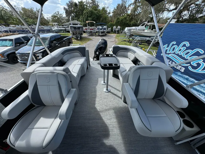Slide: The Image of 2025 Sweetwater 2286 SB pontoon boat with luxurious seating and modern design. - 8