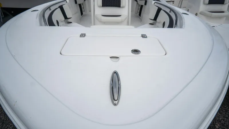Slide: The Image of 2025 Tidewater 220 CC Adventure boat deck, featuring sleek design and spacious seating. - 10