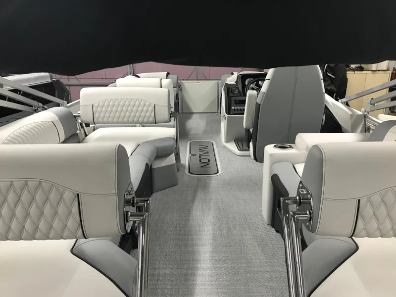 Slide: The Image of 2025 Avalon Catalina boat interior with luxurious seating and modern design. - 11