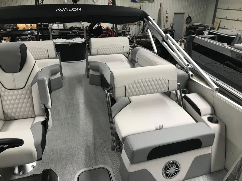 Slide: The Image of Luxurious interior of 2025 Avalon Catalina pontoon boat with plush seating. - 19
