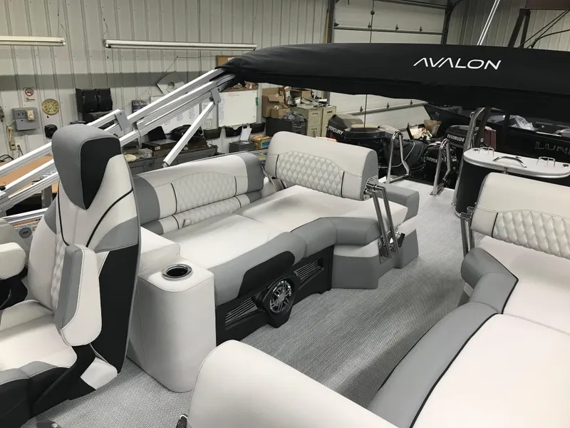 Slide: The Image of Luxurious interior of 2025 Avalon Catalina pontoon boat with plush seating and modern design. - 21