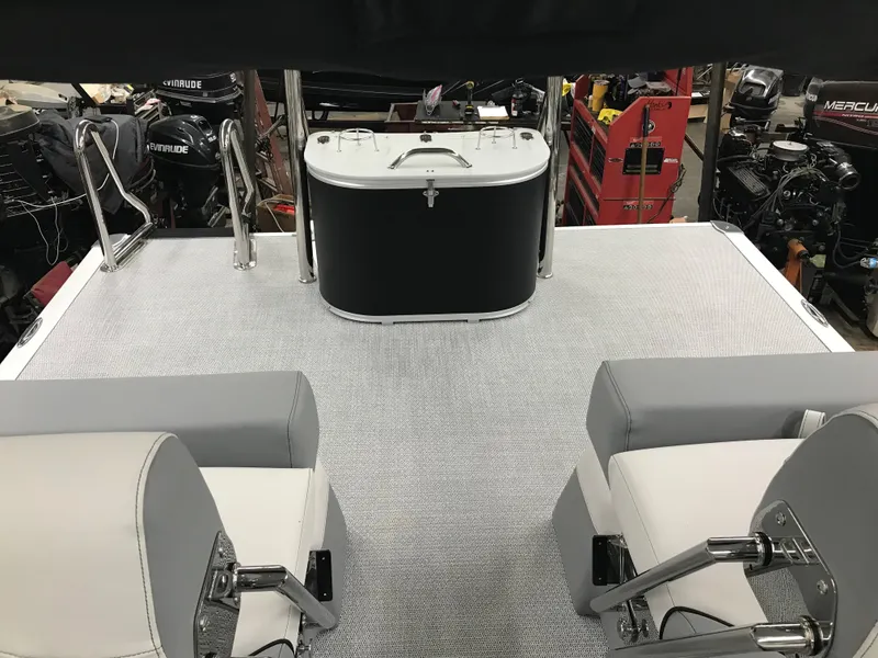 Slide: The Image of 2025 Avalon Catalina boat interior with seating and storage area. - 22