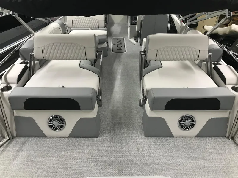 Slide: The Image of 2025 Avalon Catalina boat interior with plush seating and modern design. - 25