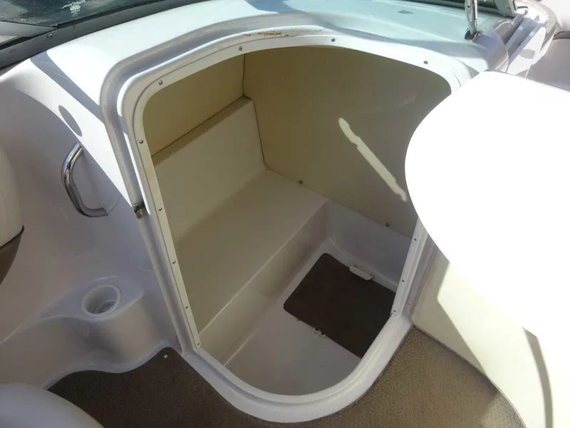 Slide: The Image of Interior storage compartment of 2002 Four Winns 234 Funship boat. - 14