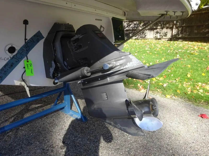 Slide: The Image of 2002 Four Winns 234 Funship boat propeller and stern drive on display. - 18