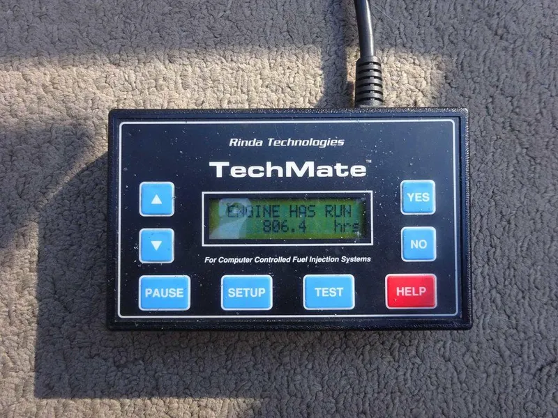 Slide: The Image of Rinda Technologies TechMate diagnostic tool displaying engine hours for 2002 Four Winns 234 Funship. - 24