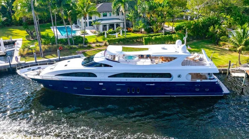 Slide: The Image of Luxurious 2011 Mengi Yay 115 MY yacht docked by a waterfront property. - 0