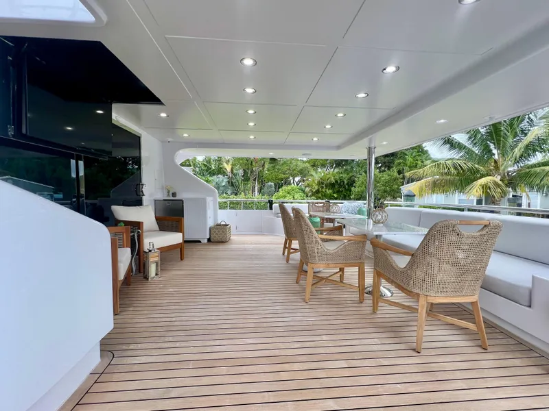 Slide: The Image of Spacious deck of 2011 Mengi Yay 115 MY yacht with elegant seating and modern design. - 15