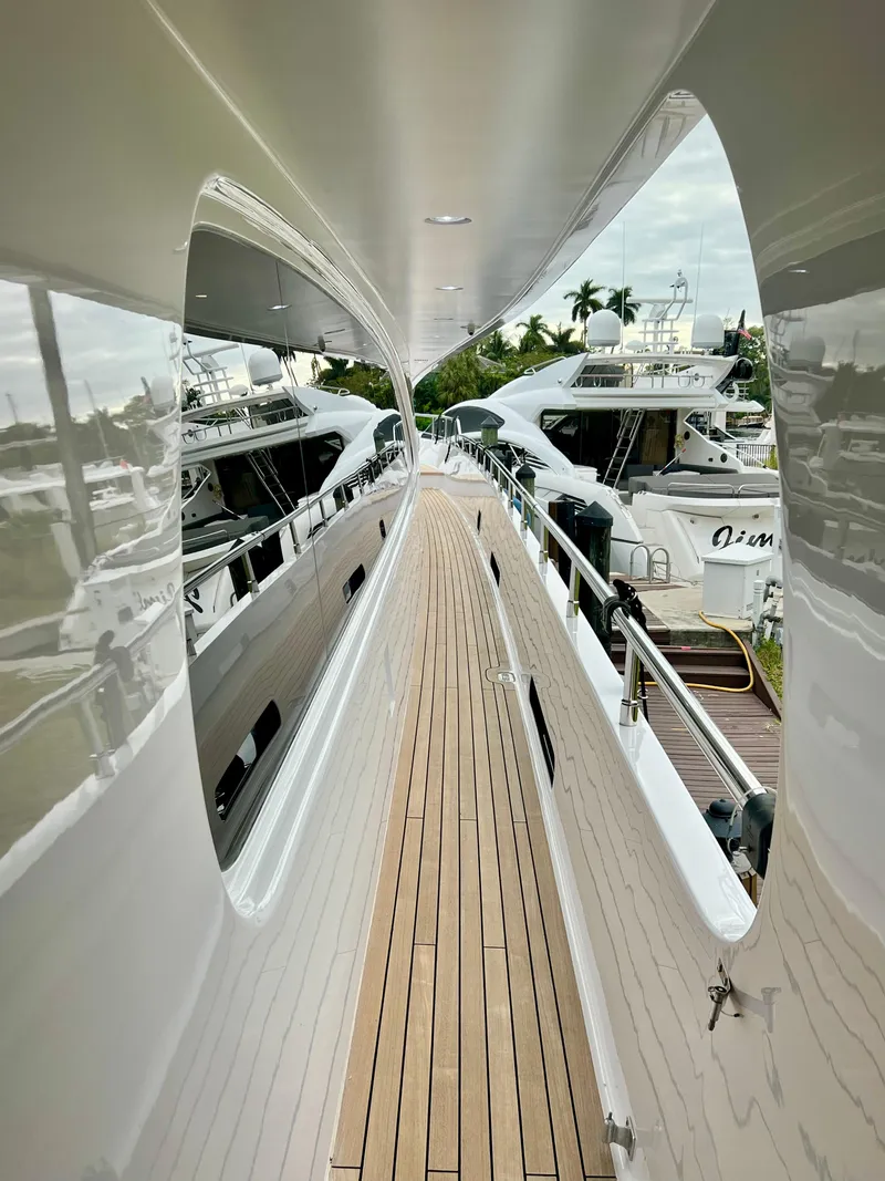 Slide: The Image of Side deck view of 2011 Mengi Yay 115 MY yacht in marina. - 17