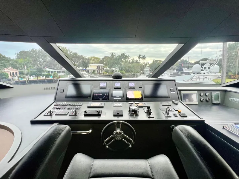 Slide: The Image of Luxury yacht helm of 2011 Mengi Yay 115 MY with advanced navigation controls. - 31