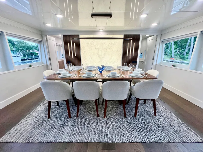 Slide: The Image of Luxurious dining area on 2011 Mengi Yay 115 MY yacht, elegantly set table. - 41