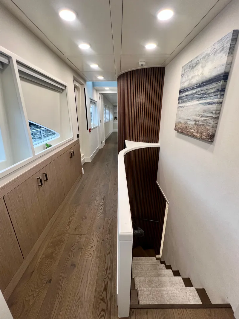 Slide: The Image of Luxurious interior hallway of 2011 Mengi Yay 115 MY yacht with modern decor. - 45