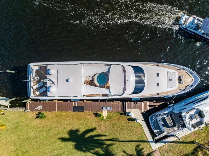 Slide: The Image of Aerial view of 2011 Mengi Yay 115 MY yacht docked by the shore. - 8