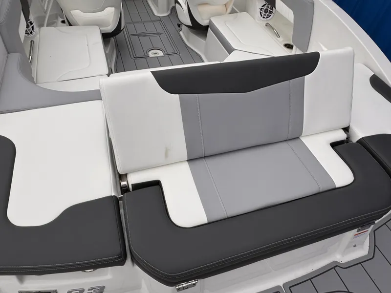 Slide: The Image of 2025 Chaparral 23 SSi OB boat interior with gray and white seating. - 27