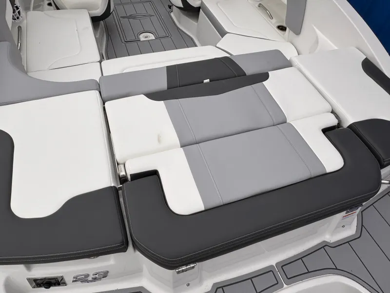 Slide: The Image of 2025 Chaparral 23 SSi OB boat interior with gray and white seating. - 29