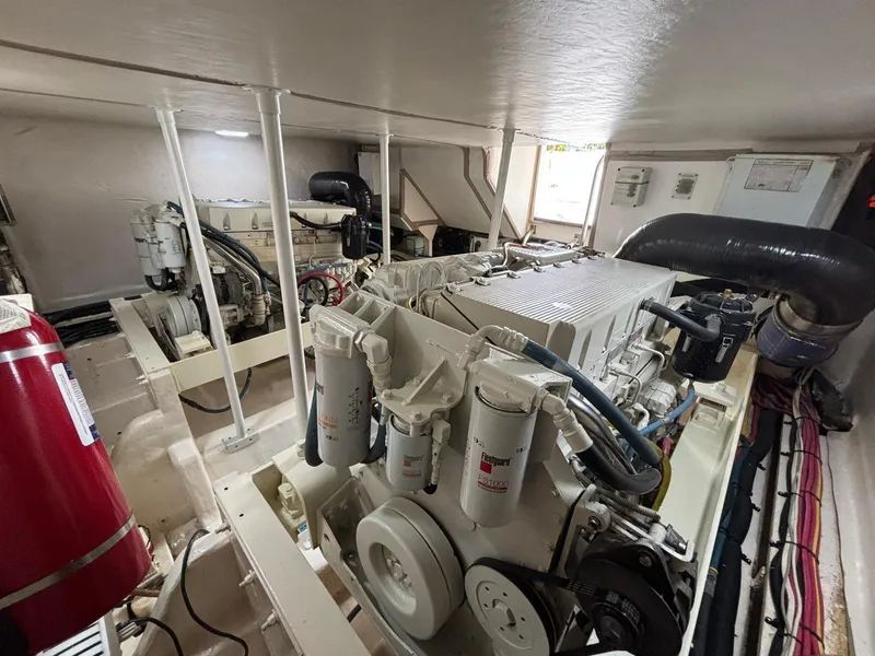 Slide: The Image of Engine room of 2006 Luhrs 41 Open boat, showcasing mechanical components and systems. - 4