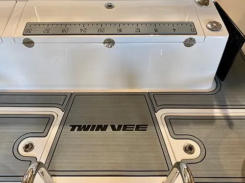 Slide: The Image of Twin Vee 240 GFX DC 2025 boat deck with measurement scale. - 23
