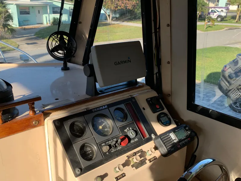 Slide: The Image of Interior of a 1998 Atlas Acadia with Garmin navigation system. - 10