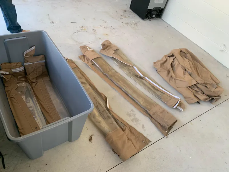 Slide: The Image of Tent tarps and accessories on concrete floor, Atlas Acadia 1998. - 14